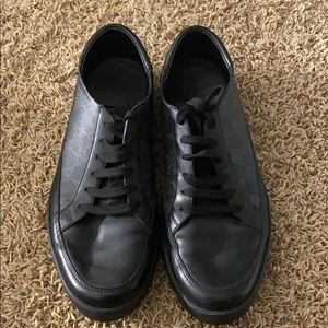 Black Gucci sneakers